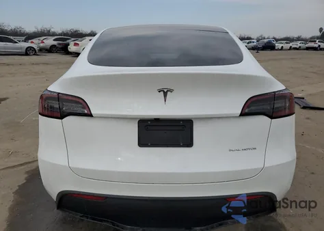 2025 Tesla Model Y из США, поврежденный, VIN 7SAYGAEE6SF268048